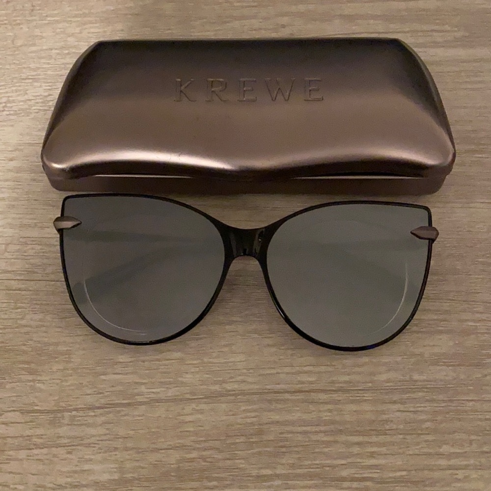 Krewe black cat eye sunglasses.